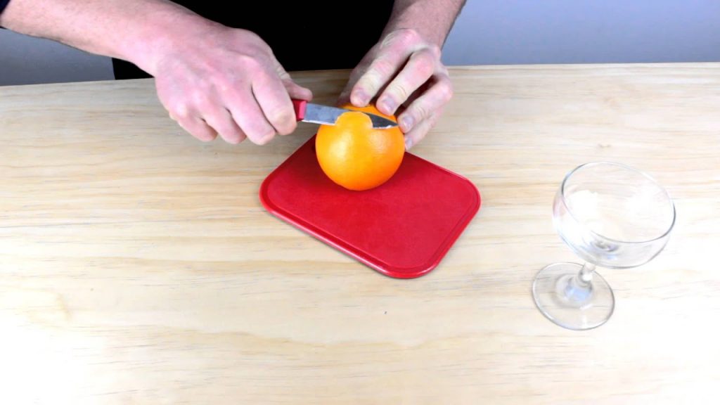 How to add a twist of orange to a cocktail